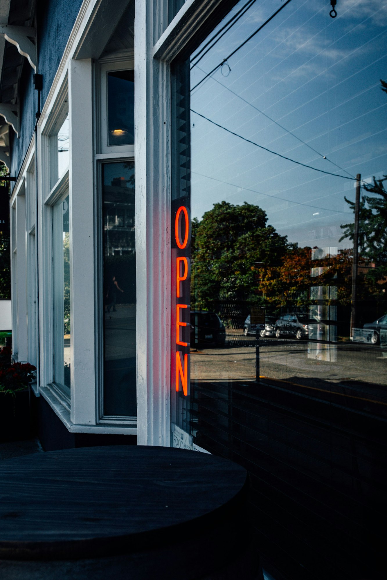 neon red open sign in window